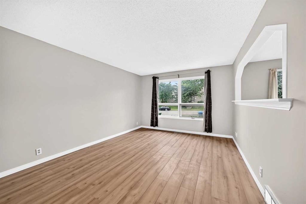19 Falshire Drive Ne, Calgary, AB - Indoor Photo Showing Other Room