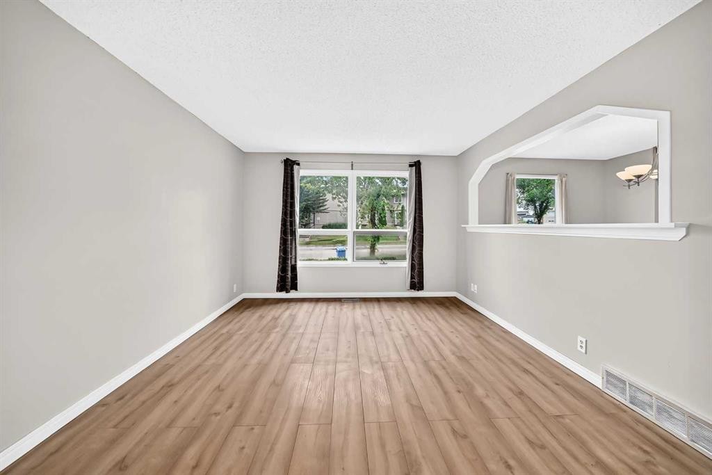 19 Falshire Drive Ne, Calgary, AB - Indoor Photo Showing Other Room
