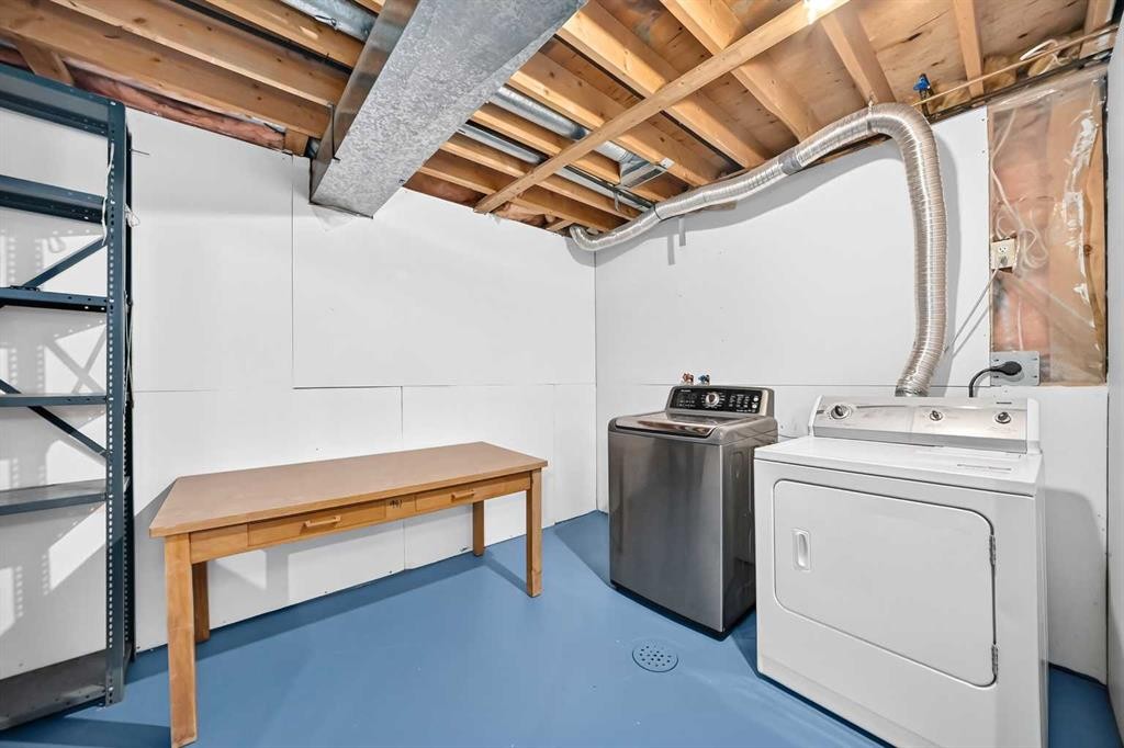 19 Falshire Drive Ne, Calgary, AB - Indoor Photo Showing Laundry Room