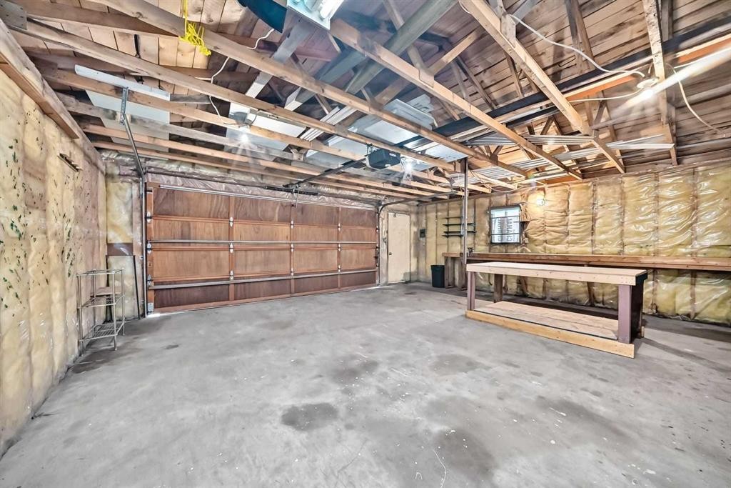 19 Falshire Drive Ne, Calgary, AB - Indoor Photo Showing Garage
