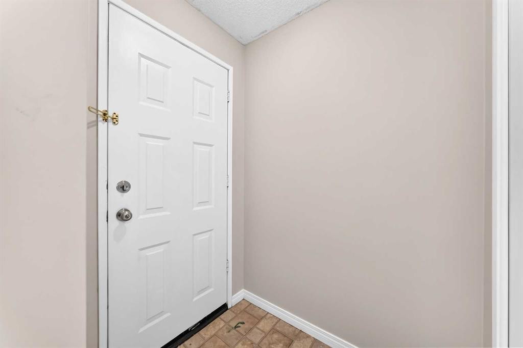 19 Falshire Drive Ne, Calgary, AB - Indoor Photo Showing Other Room