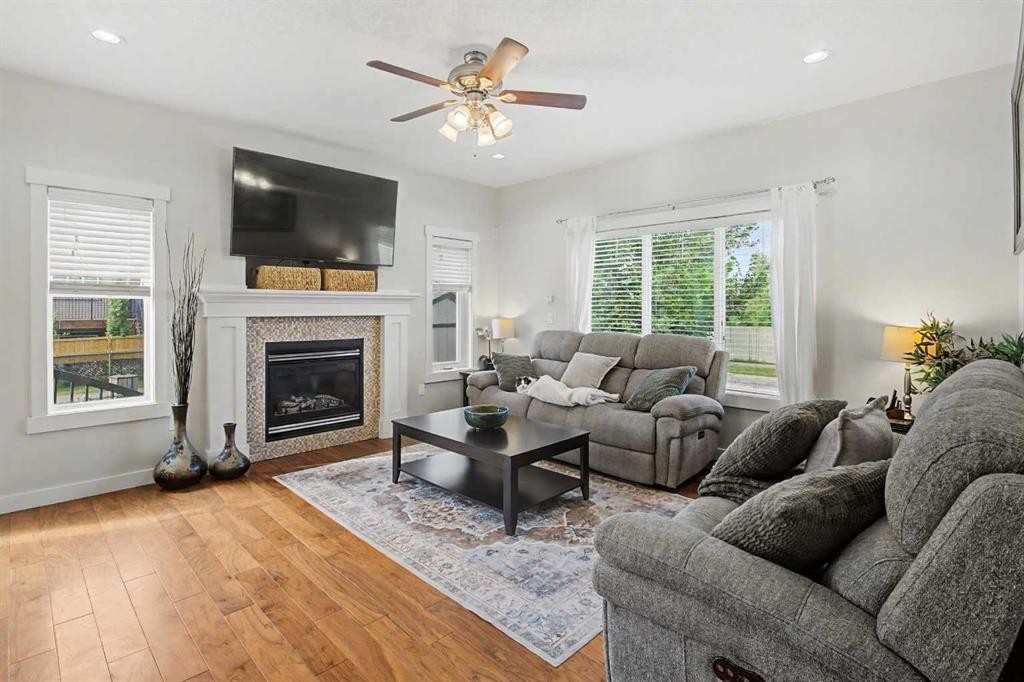 2 Baywater Cape, Airdrie, AB - Indoor Photo Showing Living Room With Fireplace