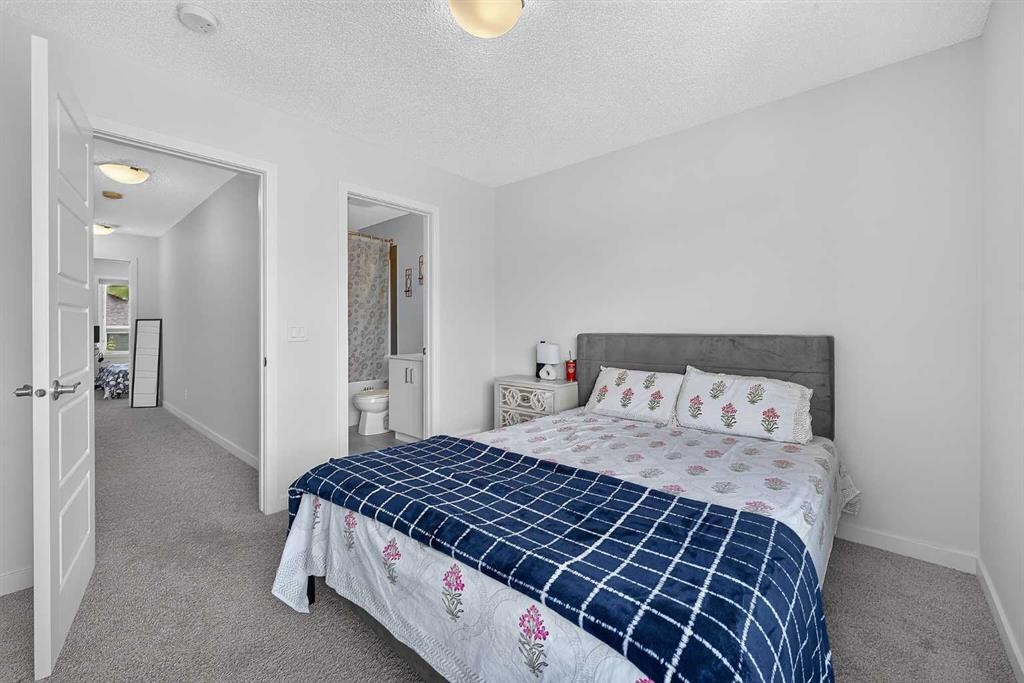 433-301 Redstone Boulevard Ne, Calgary, AB - Indoor Photo Showing Bedroom