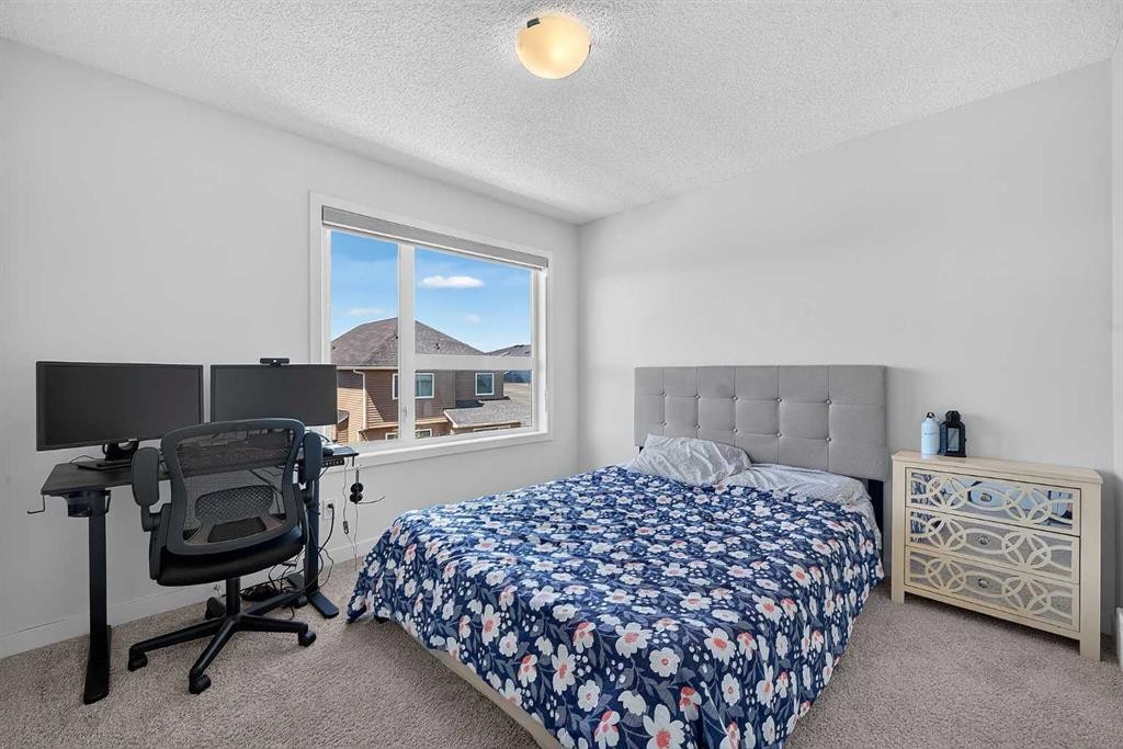 433-301 Redstone Boulevard Ne, Calgary, AB - Indoor Photo Showing Bedroom