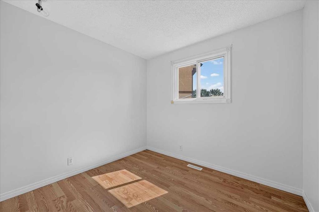 235 Abalone Place Ne, Calgary, AB - Indoor Photo Showing Other Room