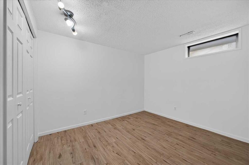 235 Abalone Place Ne, Calgary, AB - Indoor Photo Showing Other Room