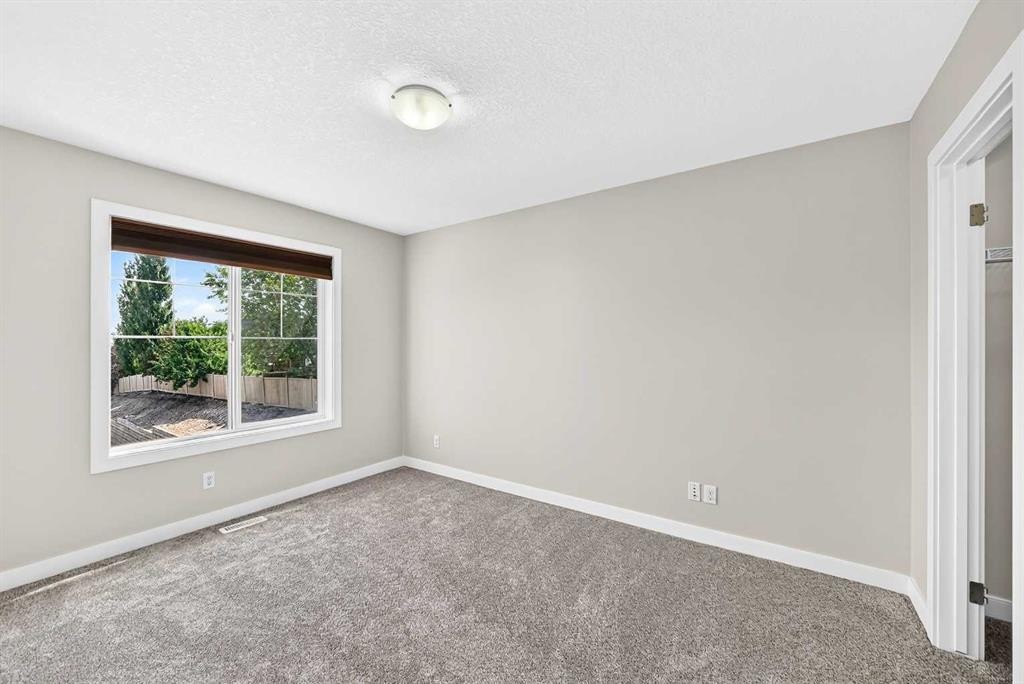 86 Pantego Lane Nw, Calgary, AB - Indoor Photo Showing Other Room