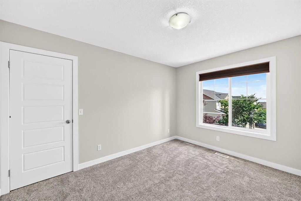 86 Pantego Lane Nw, Calgary, AB - Indoor Photo Showing Other Room