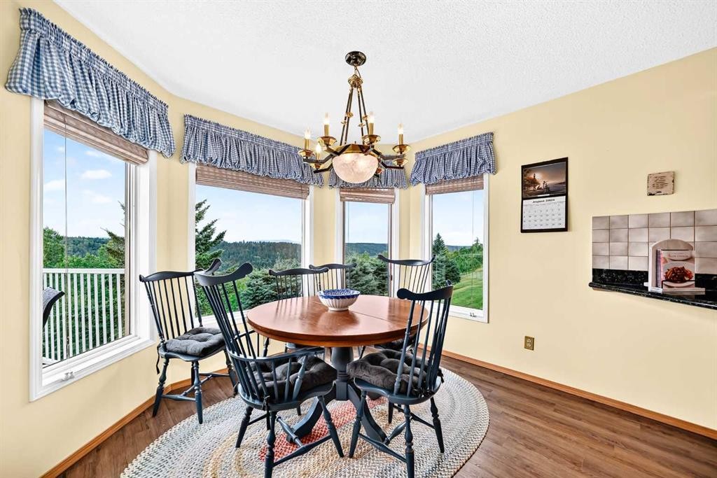36 Sunset Way, Priddis Greens, AB - Indoor Photo Showing Dining Room