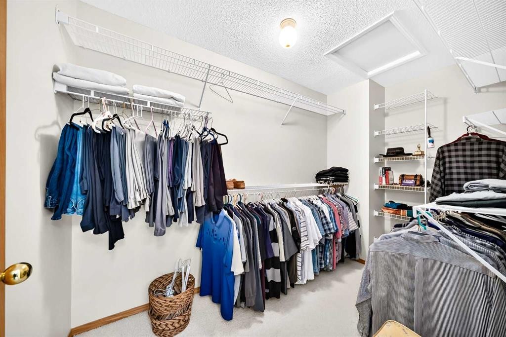 36 Sunset Way, Priddis Greens, AB - Indoor With Storage