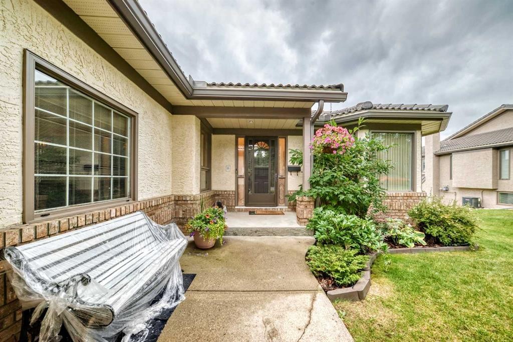 36 Sunset Way, Priddis Greens, AB - Outdoor With Deck Patio Veranda