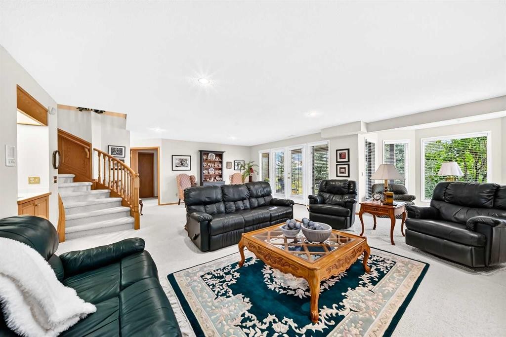 36 Sunset Way, Priddis Greens, AB - Indoor Photo Showing Living Room