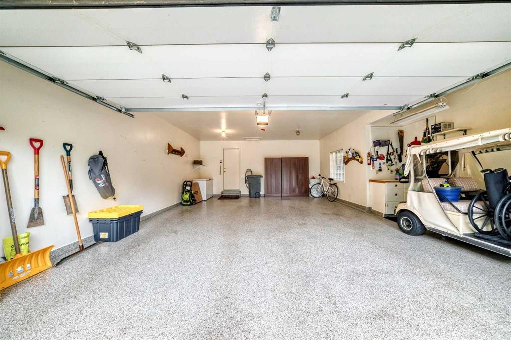 36 Sunset Way, Priddis Greens, AB - Indoor Photo Showing Garage
