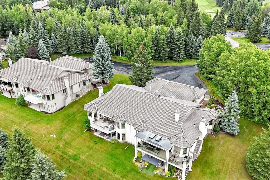 36 Sunset Way, Priddis Greens, AB - Outdoor With Deck Patio Veranda