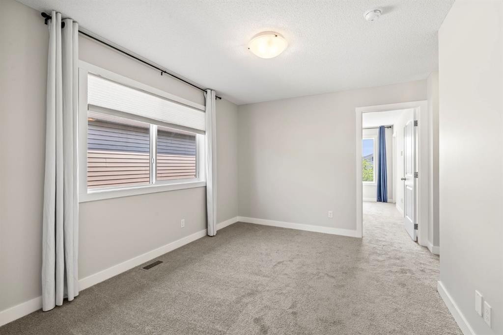 115 Wolf Willow Boulevard Se, Calgary, AB - Indoor Photo Showing Other Room