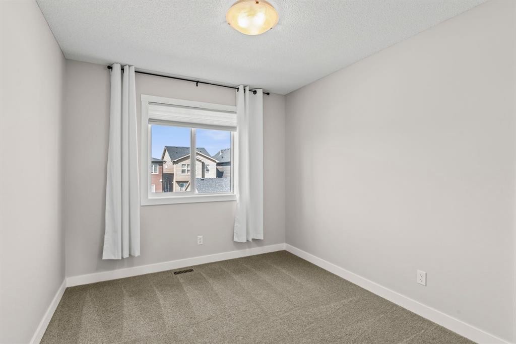 115 Wolf Willow Boulevard Se, Calgary, AB - Indoor Photo Showing Other Room