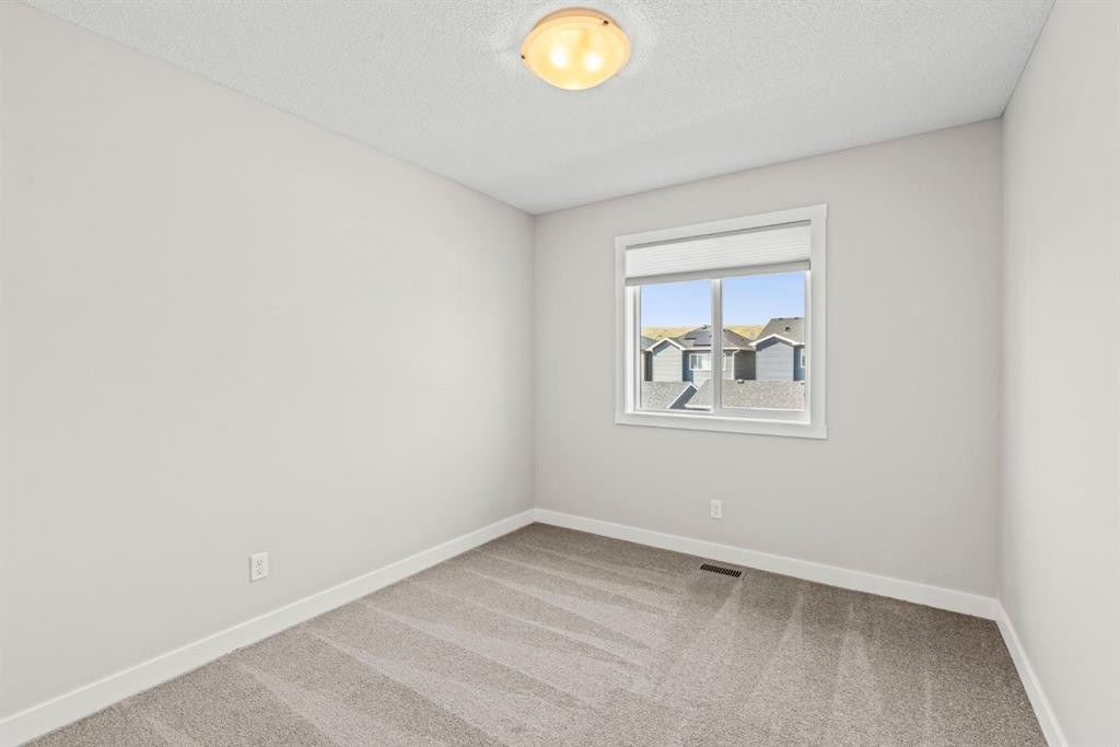 115 Wolf Willow Boulevard Se, Calgary, AB - Indoor Photo Showing Other Room