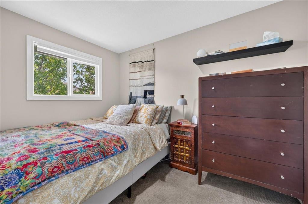 57 Beacham Way Nw, Calgary, AB - Indoor Photo Showing Bedroom