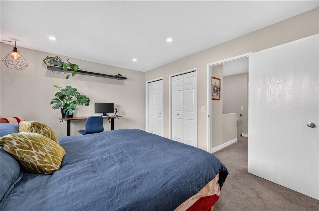 57 Beacham Way Nw, Calgary, AB - Indoor Photo Showing Bedroom