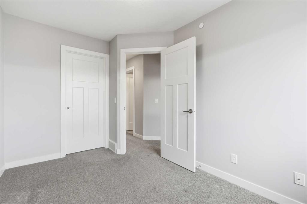 21 Howse Street Ne, Calgary, AB - Indoor Photo Showing Other Room