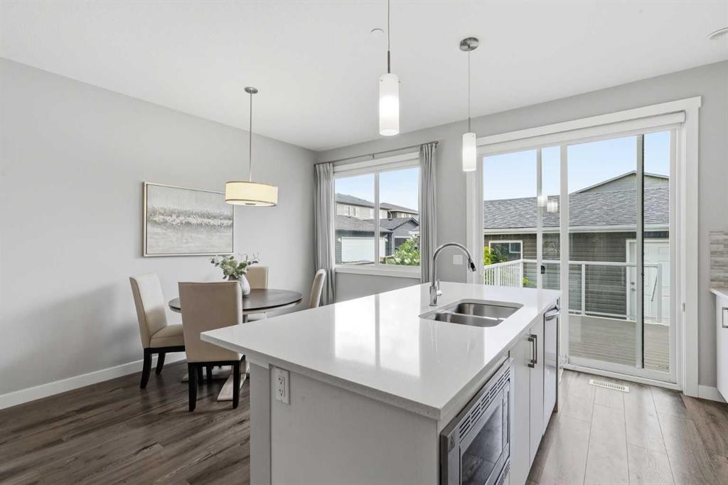 21 Howse Street Ne, Calgary, AB - Indoor Photo Showing Kitchen With Double Sink With Upgraded Kitchen