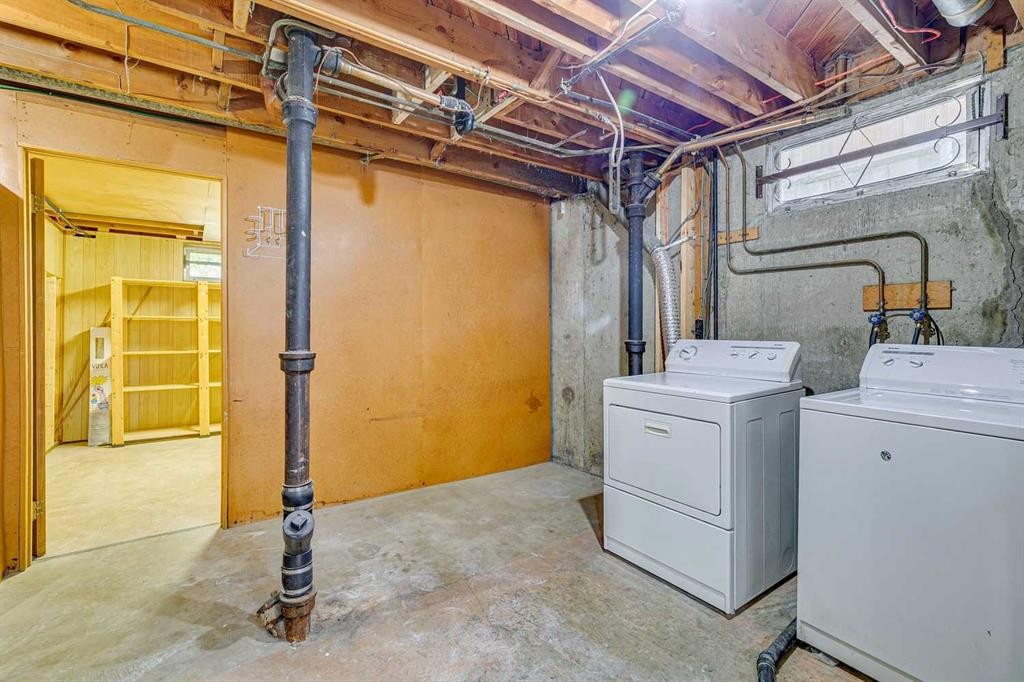10415 8 Street Sw, Calgary, AB - Indoor Photo Showing Laundry Room