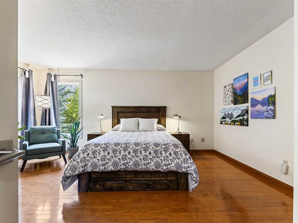 115 Wood Valley Court Sw, Calgary, AB - Indoor Photo Showing Bedroom