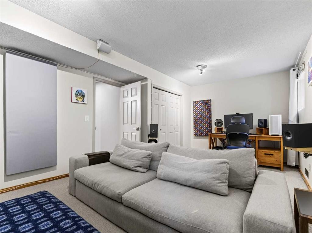 115 Wood Valley Court Sw, Calgary, AB - Indoor Photo Showing Living Room