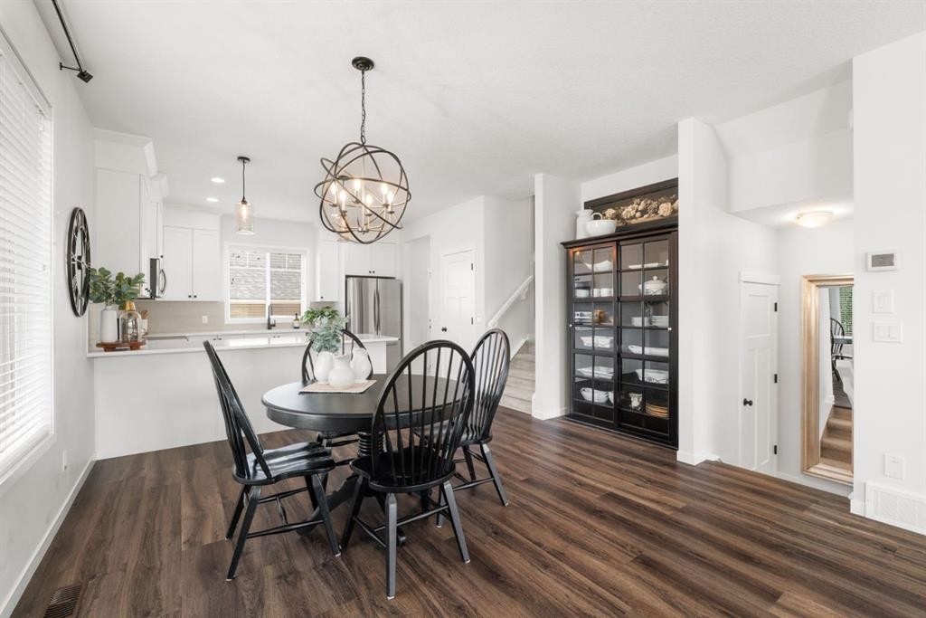 45 Willow Green Way, Cochrane, AB - Indoor Photo Showing Dining Room