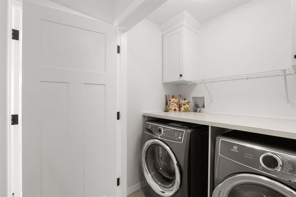 45 Willow Green Way, Cochrane, AB - Indoor Photo Showing Laundry Room