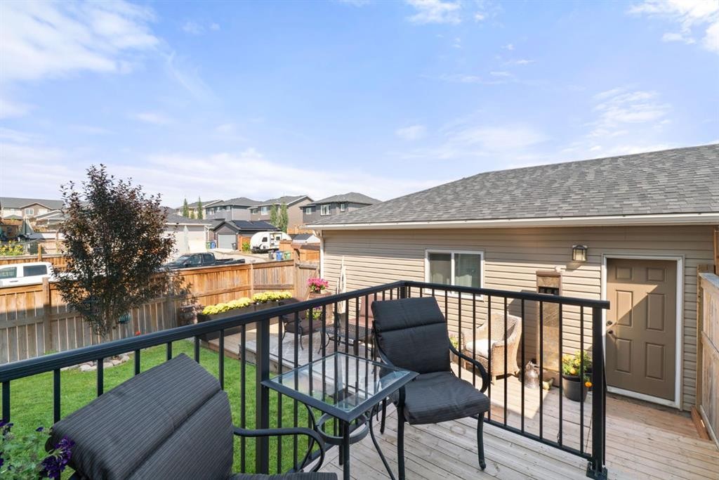 45 Willow Green Way, Cochrane, AB - Outdoor With Deck Patio Veranda With Exterior