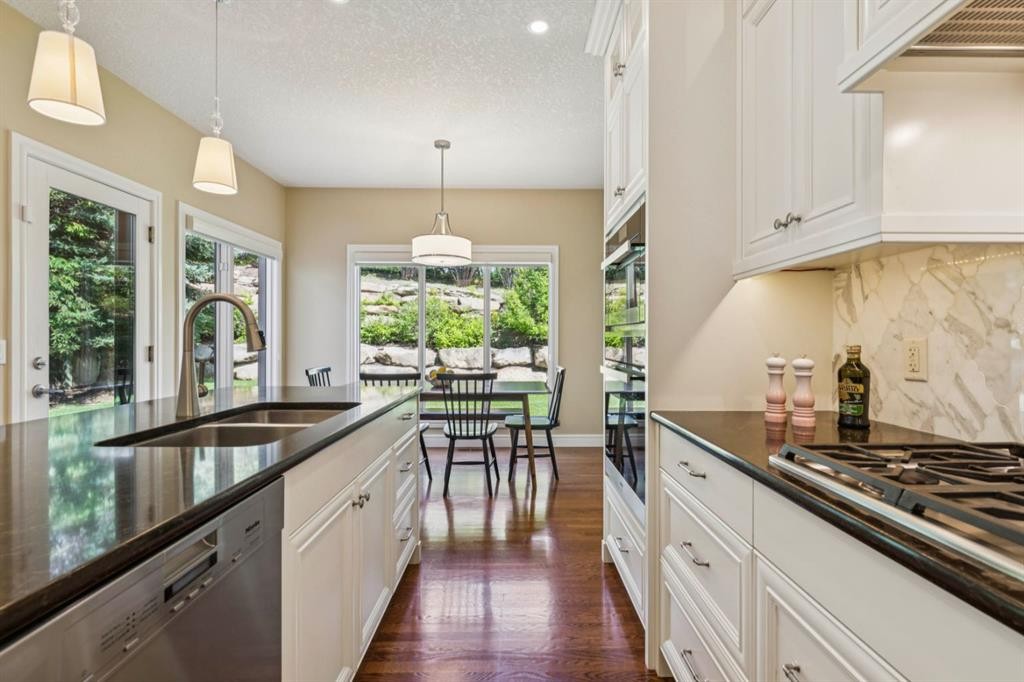 174 Sienna Hills Drive Sw, Calgary, AB - Indoor Photo Showing Kitchen With Double Sink With Upgraded Kitchen