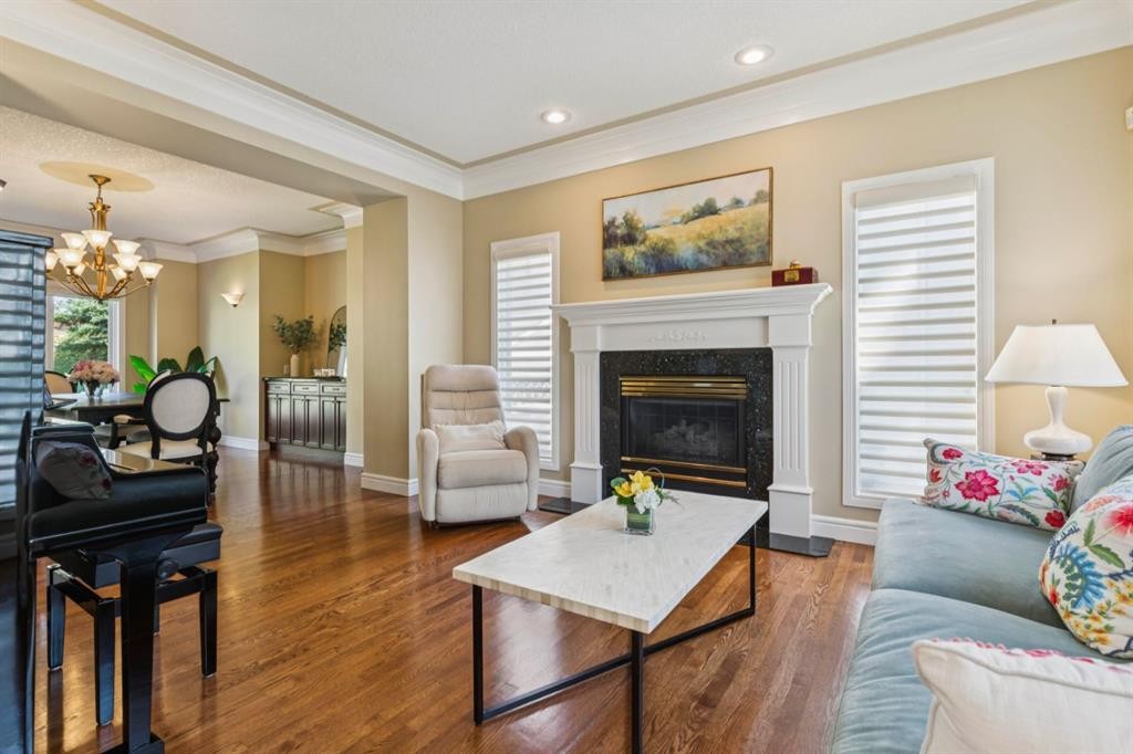174 Sienna Hills Drive Sw, Calgary, AB - Indoor Photo Showing Living Room With Fireplace
