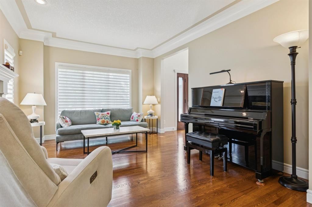 174 Sienna Hills Drive Sw, Calgary, AB - Indoor Photo Showing Living Room