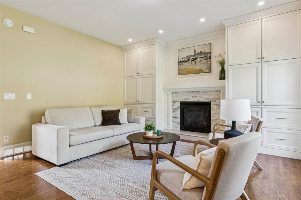 174 Sienna Hills Drive Sw, Calgary, AB - Indoor Photo Showing Living Room With Fireplace