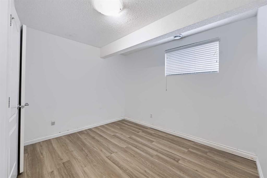 8245 Saddlebrook Drive Ne, Calgary, AB - Indoor Photo Showing Other Room