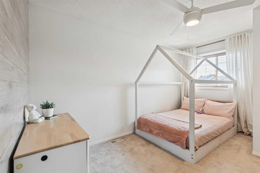 258 West Ranch Place Sw, Calgary, AB - Indoor Photo Showing Bedroom