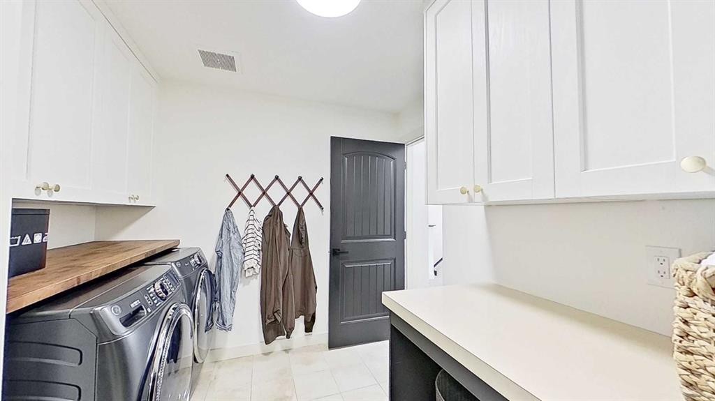 107 Auburn Sound Cove Se, Calgary, AB - Indoor Photo Showing Laundry Room