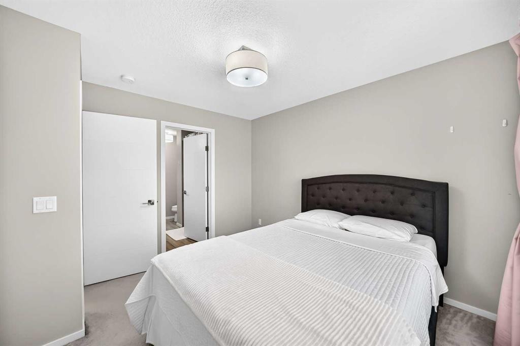 203-120 Redstone Walk Ne, Calgary, AB - Indoor Photo Showing Bedroom
