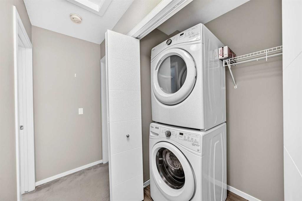 203-120 Redstone Walk Ne, Calgary, AB - Indoor Photo Showing Laundry Room