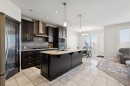 215 Redstone Heights Ne, Calgary, AB  - Indoor Photo Showing Kitchen With Upgraded Kitchen 