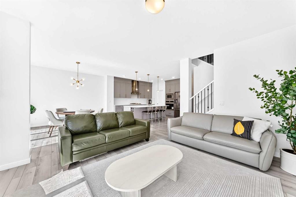 105 Magnolia Manor Se, Calgary, AB - Indoor Photo Showing Living Room