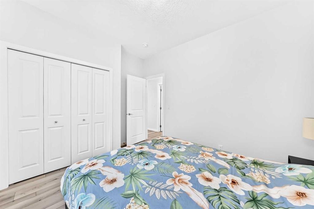 105 Magnolia Manor Se, Calgary, AB - Indoor Photo Showing Bedroom