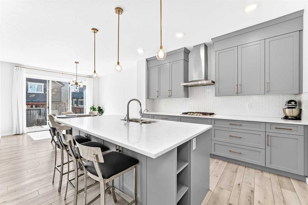 105 Magnolia Manor Se, Calgary, AB - Indoor Photo Showing Kitchen With Upgraded Kitchen
