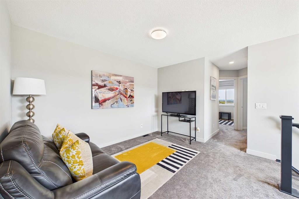 182 Rowley Gate Nw, Calgary, AB - Indoor Photo Showing Living Room