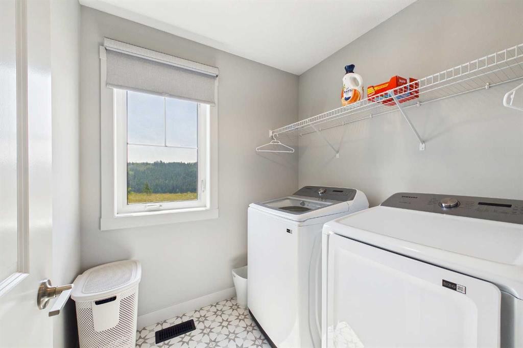 182 Rowley Gate Nw, Calgary, AB - Indoor Photo Showing Laundry Room