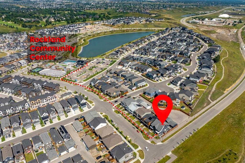 182 Rowley Gate Nw, Calgary, AB - With Body Of Water With View