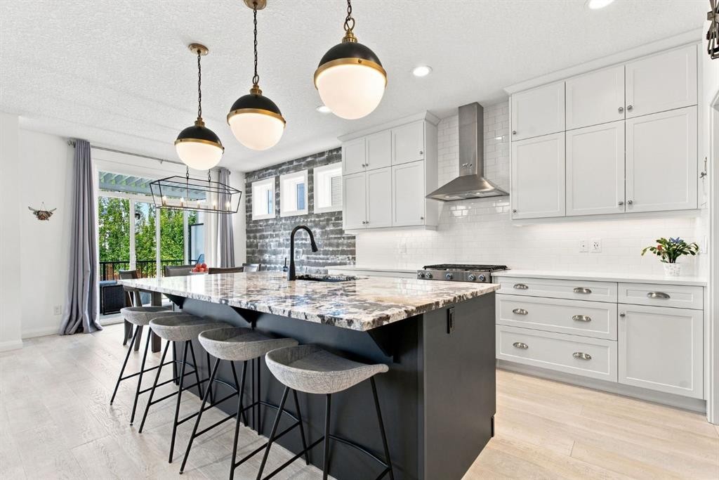 218 Boulder Creek Place, Langdon, AB - Indoor Photo Showing Kitchen With Upgraded Kitchen