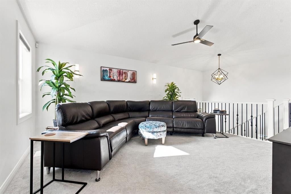 218 Boulder Creek Place, Langdon, AB - Indoor Photo Showing Living Room