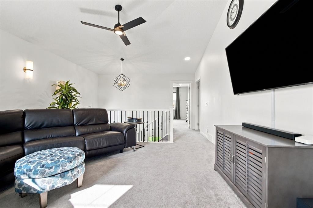 218 Boulder Creek Place, Langdon, AB - Indoor Photo Showing Living Room